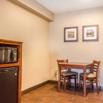 Comfort Inn & Suites Rocklin - Roseville king suite dining table, microwave, and mini fridge