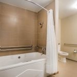 Comfort Inn & Suites Rocklin - Roseville king jacuzzi suite accessible whirlpool tub and toilet
